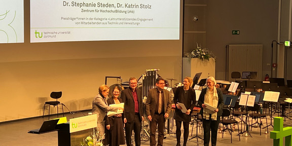 Presentation of the prizes on the podium. From left to right: Wiebke Möhring, Katrin Stolz, Volker Mattick, Markus Alex, Stephanie Steden, Andrea Martin.
